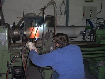 Pulverflammspritzen mit Metall
